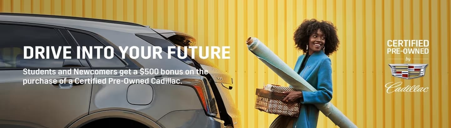A woman smiling while carrying a rolled-up carpet and a basket, standing next to a Cadillac vehicle. The image promotes a $500 bonus for students and newcomers on the purchase of a Certified Pre-Owned Cadillac, set against a vibrant yellow background.