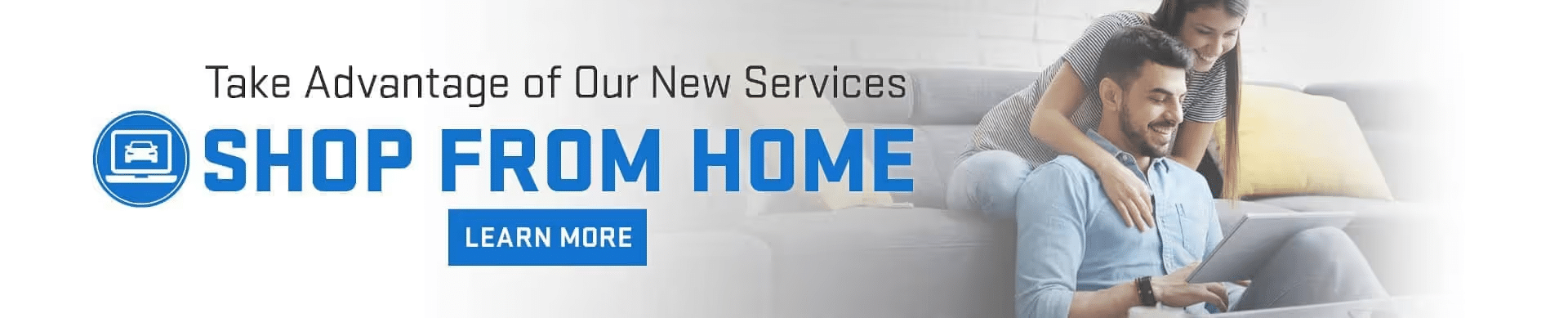 Image promoting the "Shop From Home" service, featuring a smiling couple using a laptop on a sofa, highlighting convenience and new services available.